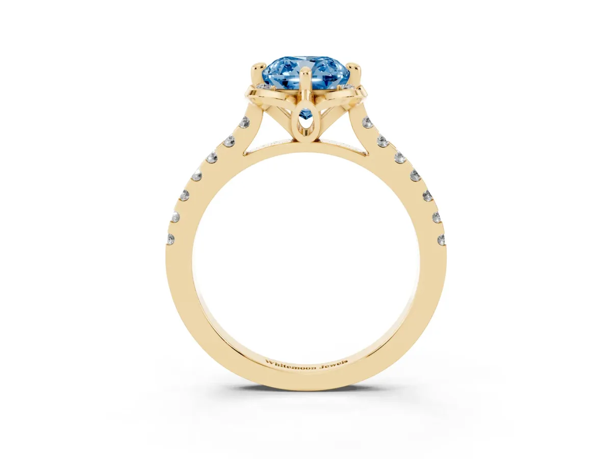 Fancy Blue Cushion Cut Diamond Ring with Pavé Band and Floral Prong Setting Yellow gold