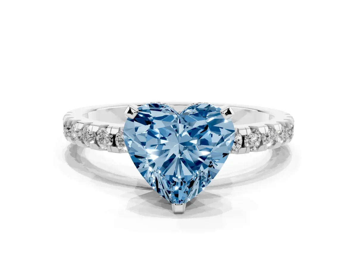 Fancy Blue Heart Cut Diamond Solitaire Ring with Round Pavé Band and Four-Prong Setting Silver