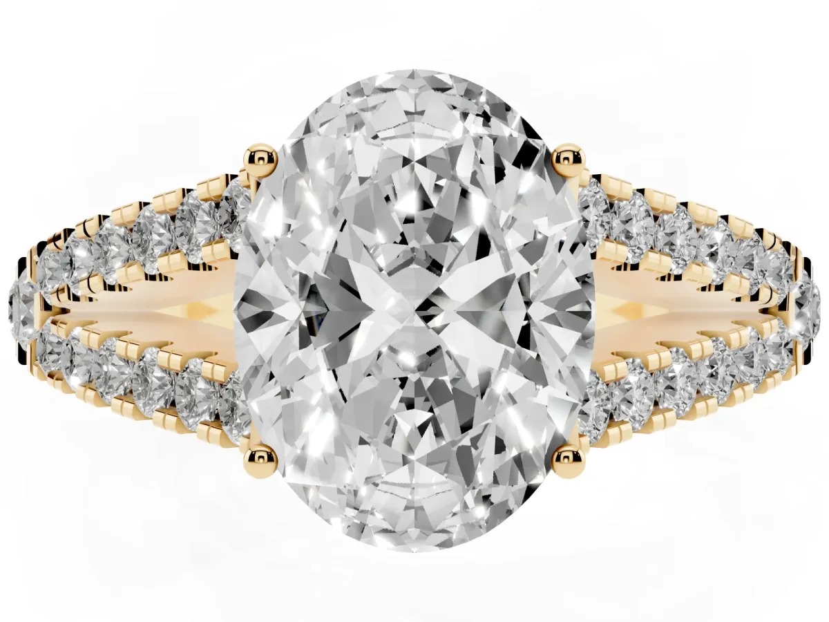 Oval Cut Diamond Split Shank Engagement Ring with Round Pavé and Prong Setting Yellow gold