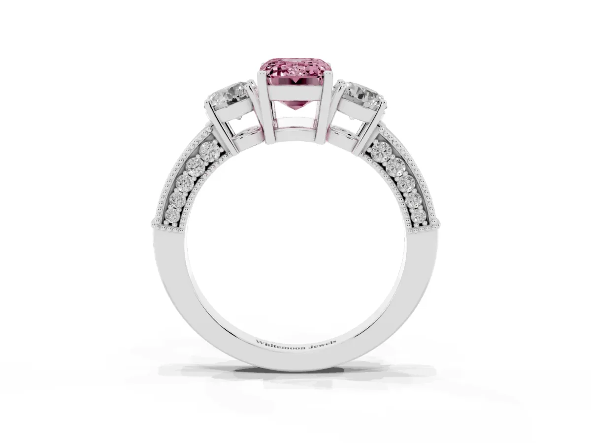 Fancy Pink Emerald Cut Three-Stone Diamond Ring with Pavé Band and Four-Prong Setting Platinum