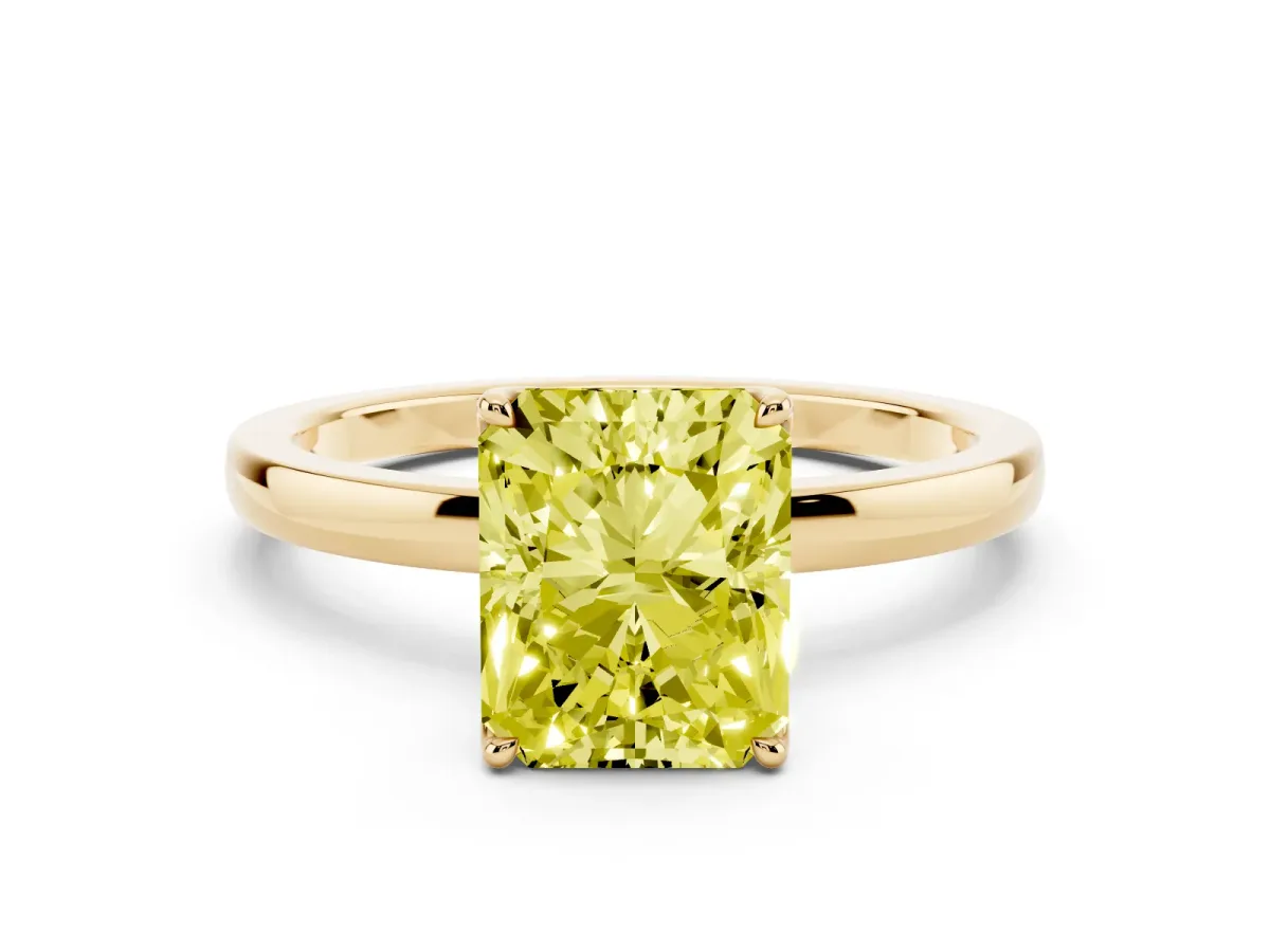Fancy Yellow Radiant Cut Diamond Solitaire Ring with Thin Band and Prong Setting Yellow gold