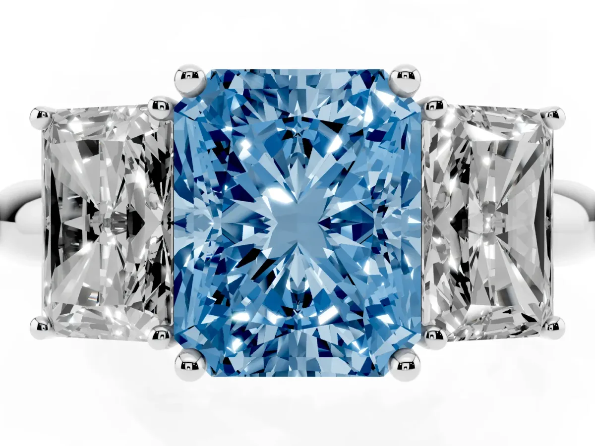 Fancy Blue Three-Stone Radiant Cut Cut Diamond Engagement Ring with Prong Setting on a White Gold Band Silver