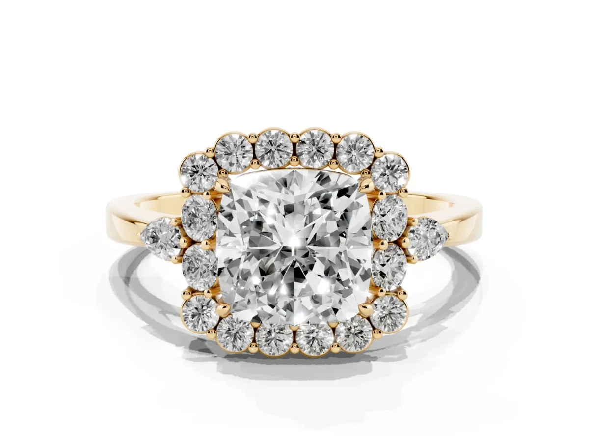 Cushion Cut Diamond Halo Ring with Pear Side Stones and Prong Setting Yellow gold