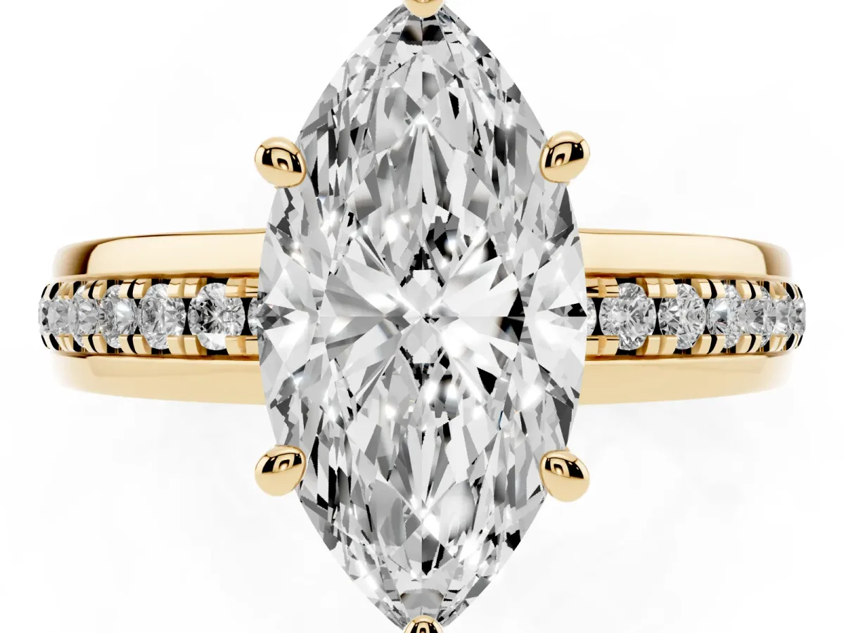 Marquise Cut Solitaire Diamond Ring with Channel Set Band and Six-Prong Setting Yellow gold
