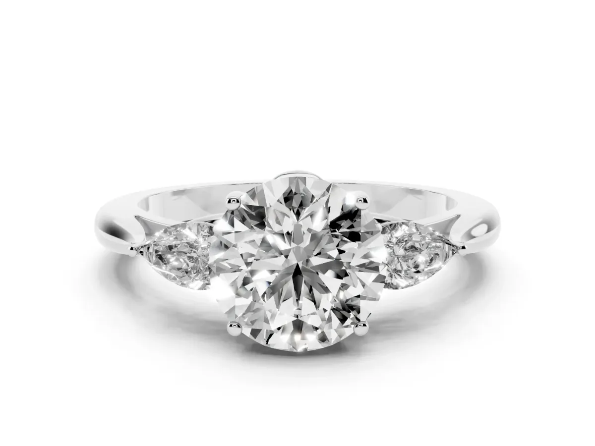 Three-Stone Round Cut Brilliant Diamond Solitaire Ring with Tapered Band and Four-Prong Setting Silver