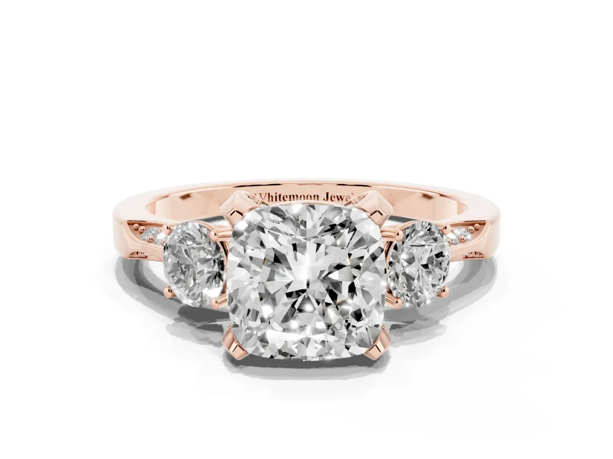 Cushion Cut Brilliant Three-Stone Diamond Ring with Pavé Band and Four-Prong Setting Rose gold