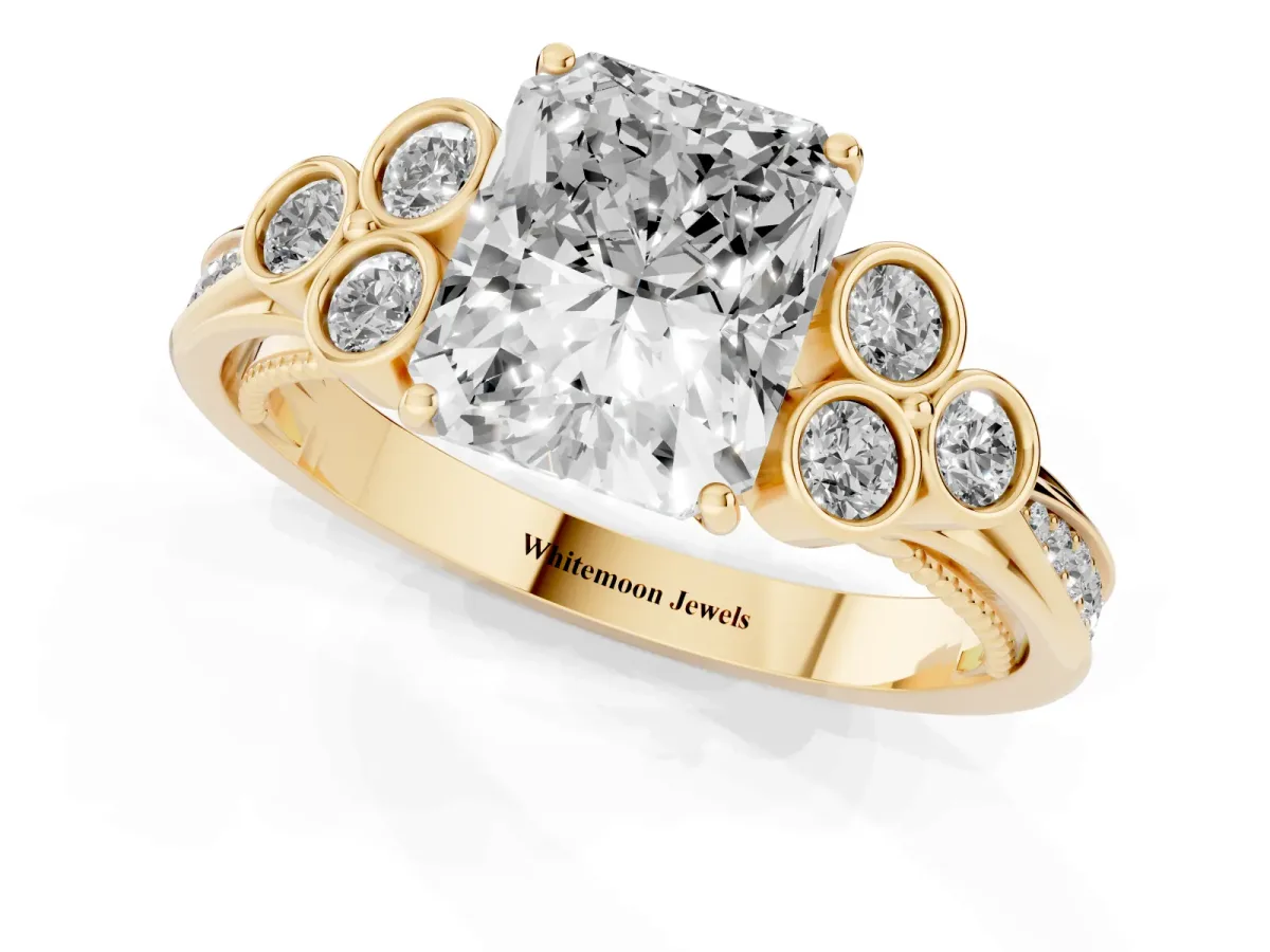 Radiant Cut Cut Diamond Engagement Ring with Bezel Set Round Side Stones and Prong Setting Yellow gold