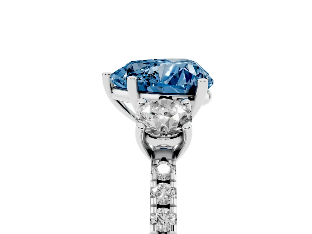 Fancy Blue Three-Stone Heart Cut Cut Diamond Pavé Band with Prong Setting Platinum