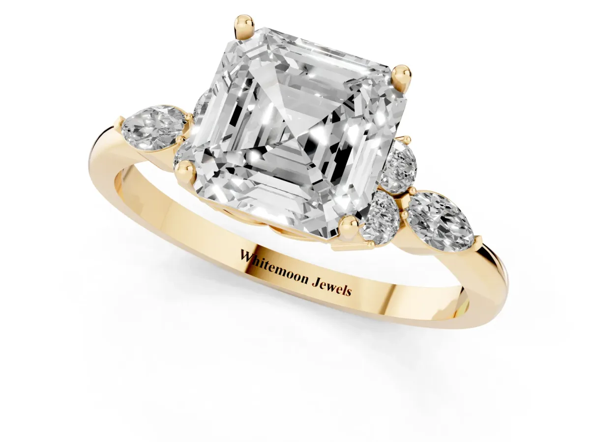 Asscher Cut Brilliant Diamond Solitaire Ring with Pear Side Stones and Four-Prong Setting Yellow gold