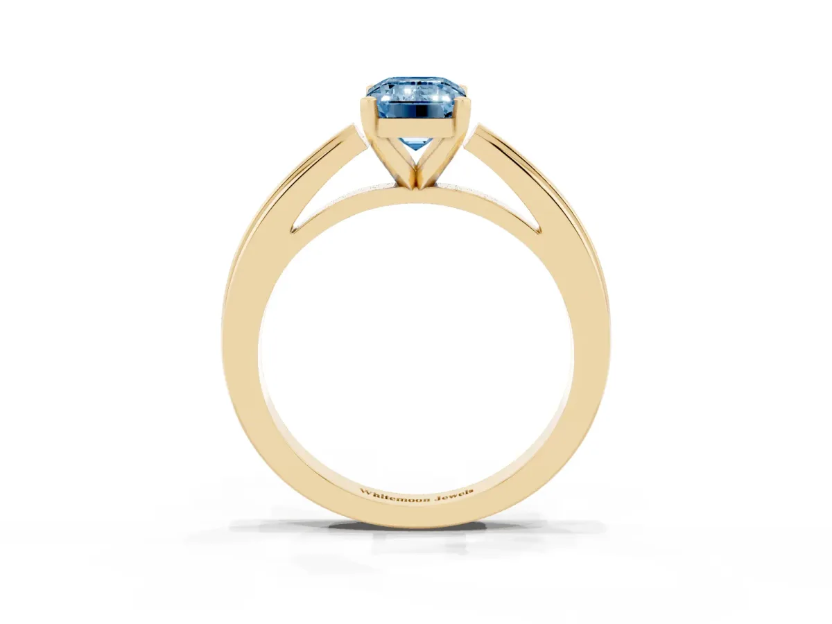 Fancy Blue Emerald Cut Solitaire Diamond Ring with Four-Prong Setting and Classic Band Yellow gold