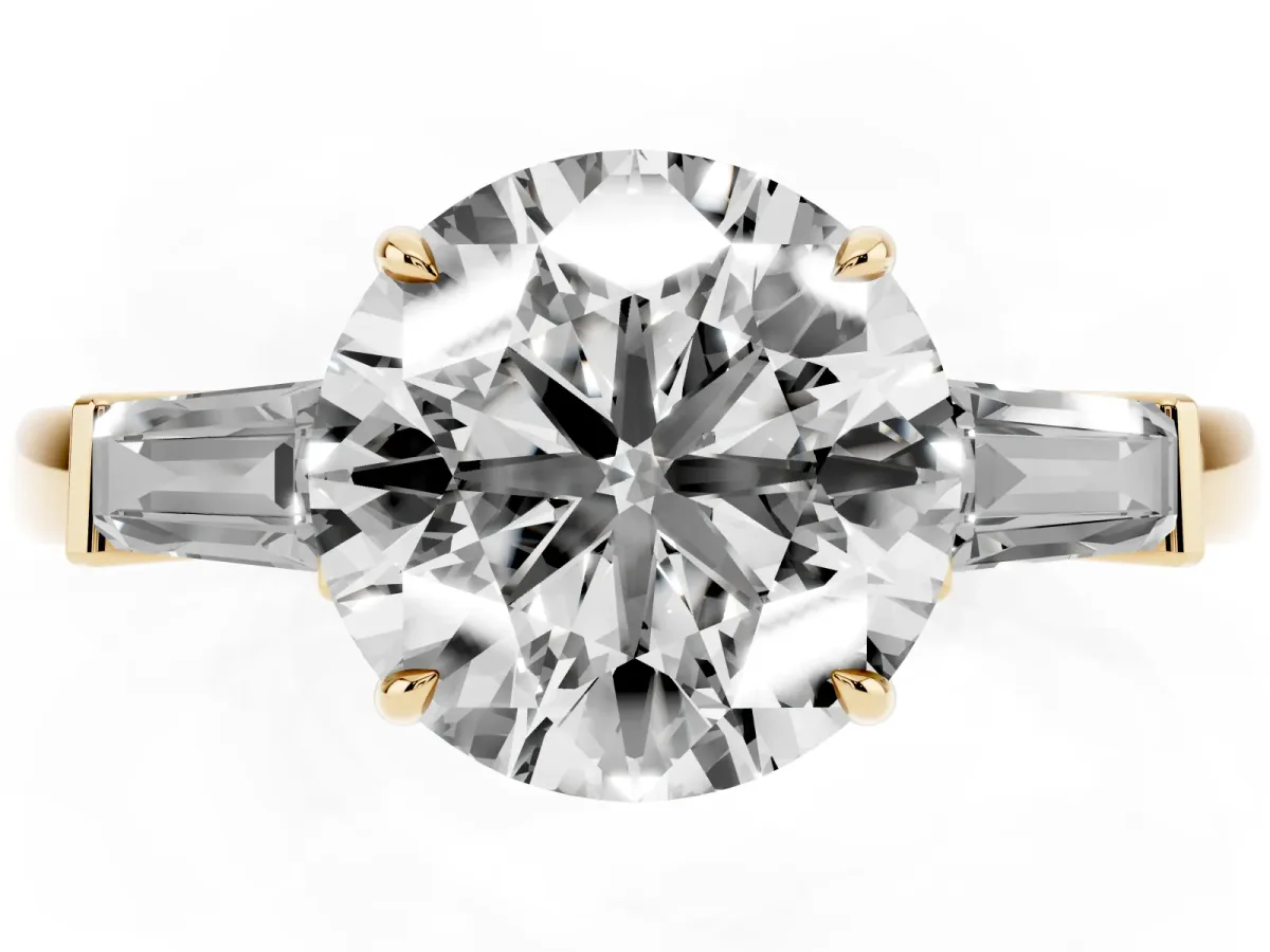 Round Cut Diamond Three-Stone Ring with Tapered Baguette Side Stones and Prong Setting Yellow gold