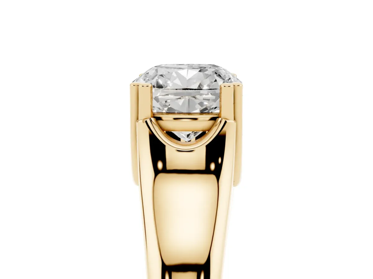 Cushion Cut Diamond Solitaire Ring with Wide Band and Prong Setting Yellow gold