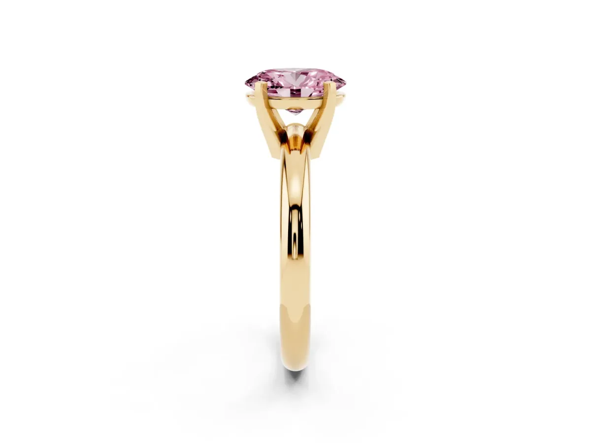 Fancy Pink Oval Cut Diamond Solitaire Engagement Ring with Round Band and Four-Prong Setting Yellow gold