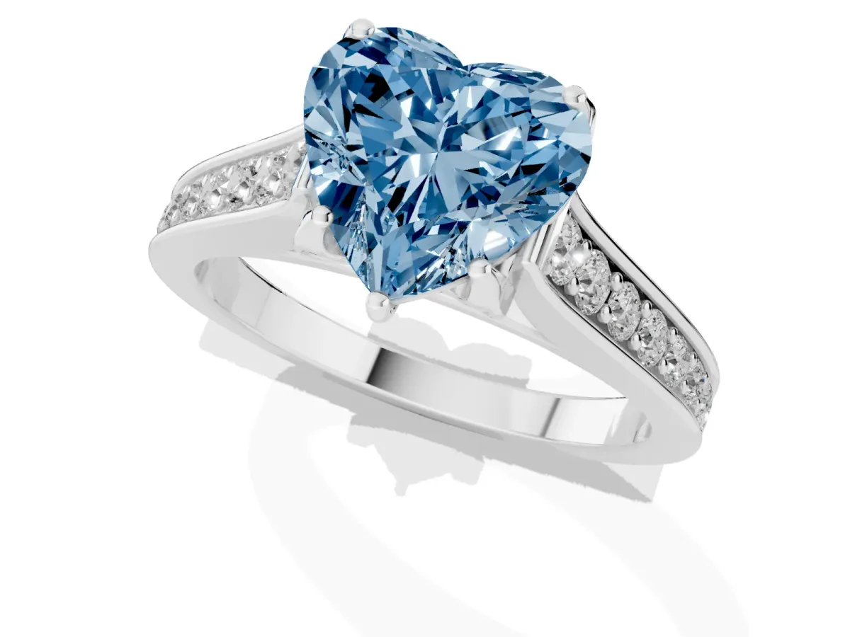 Fancy Blue Heart Cut Brilliant Cut Diamond Engagement Ring with Pavé Band and Four-Prong Setting Silver