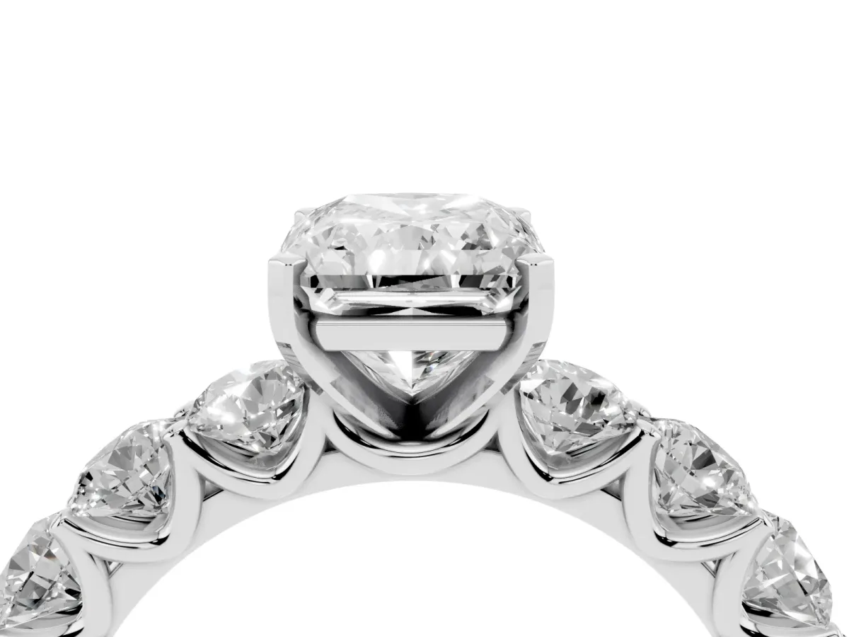 Radiant Cut Diamond Prong Setting with Side Stones on a Pave Band Silver
