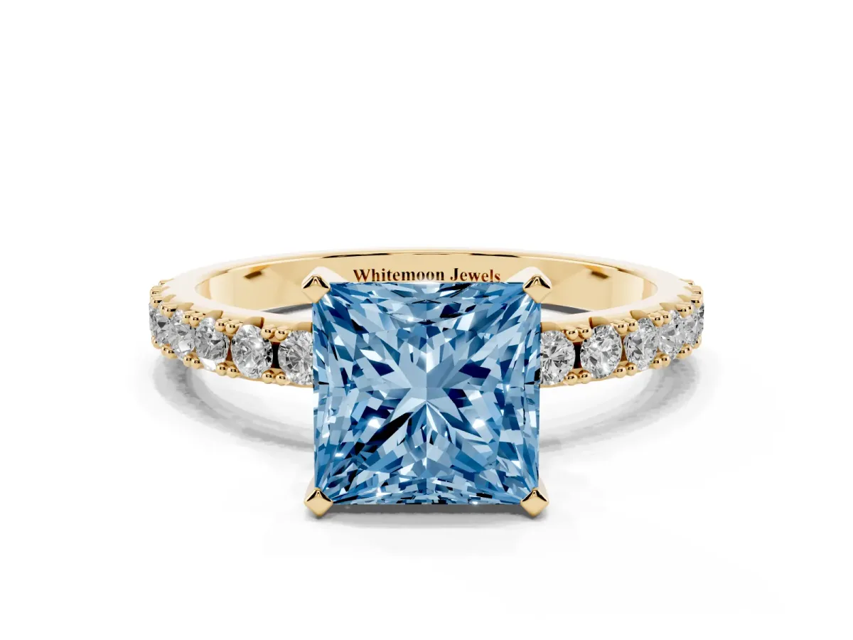 Fancy Blue Princess Cut Diamond Solitaire Pavé Band with Four-Prong Setting Yellow gold