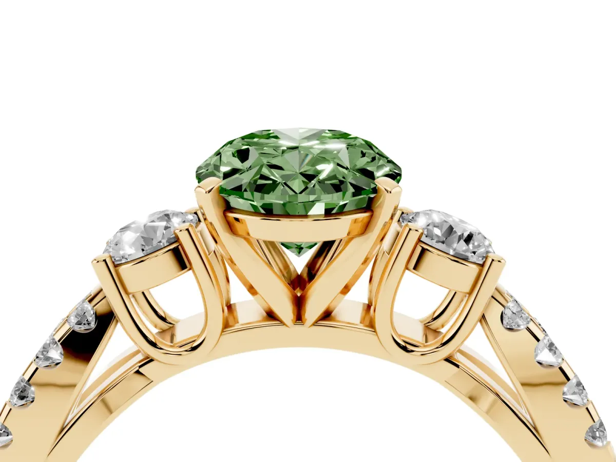Fancy Green Oval Cut Diamond Three-Stone Ring with Pavé Split Shank and Four-Prong Setting Yellow gold