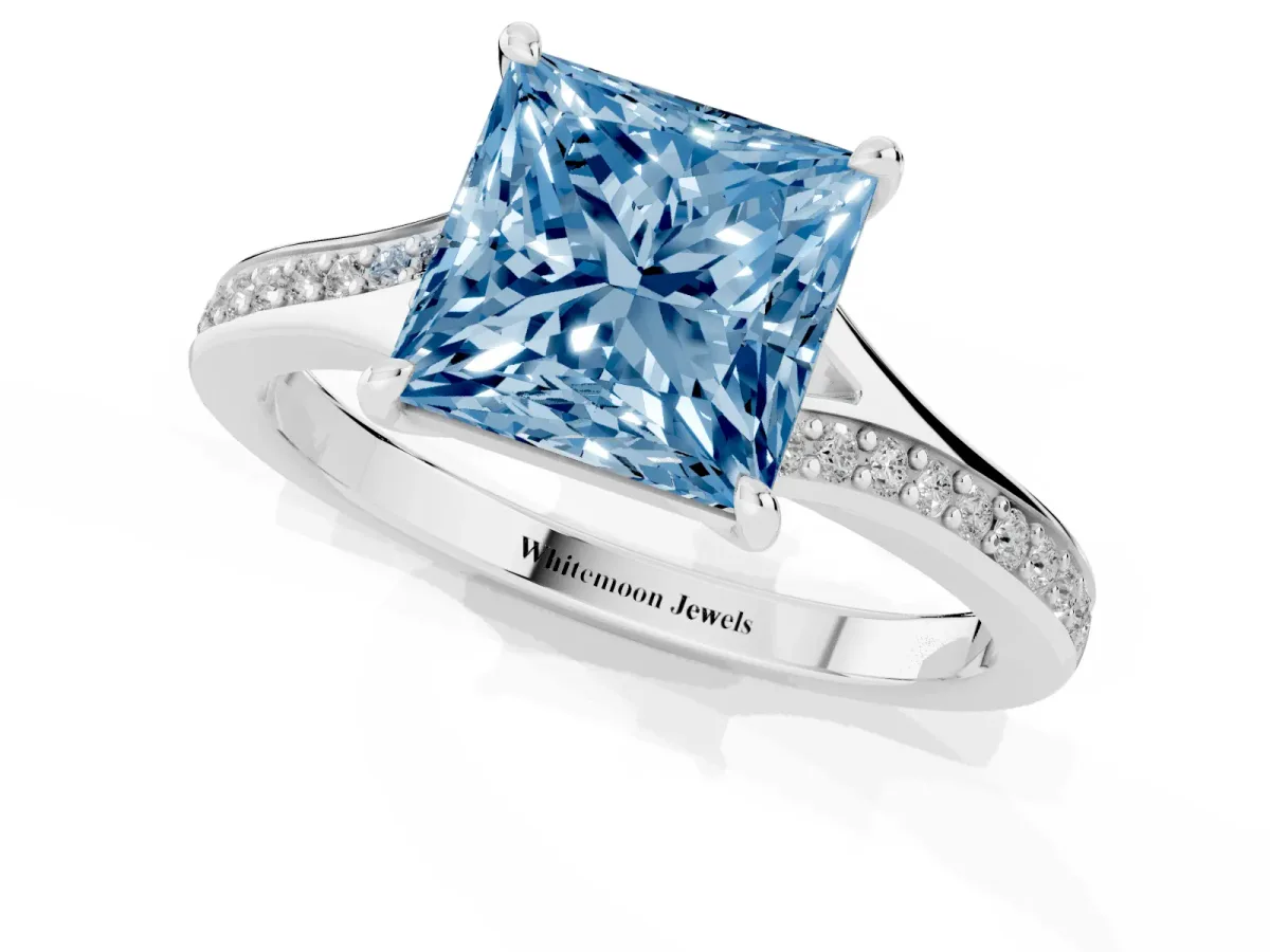 Fancy Blue Princess Cut Diamond Solitaire Ring with Pavé Band and Prong Setting Silver