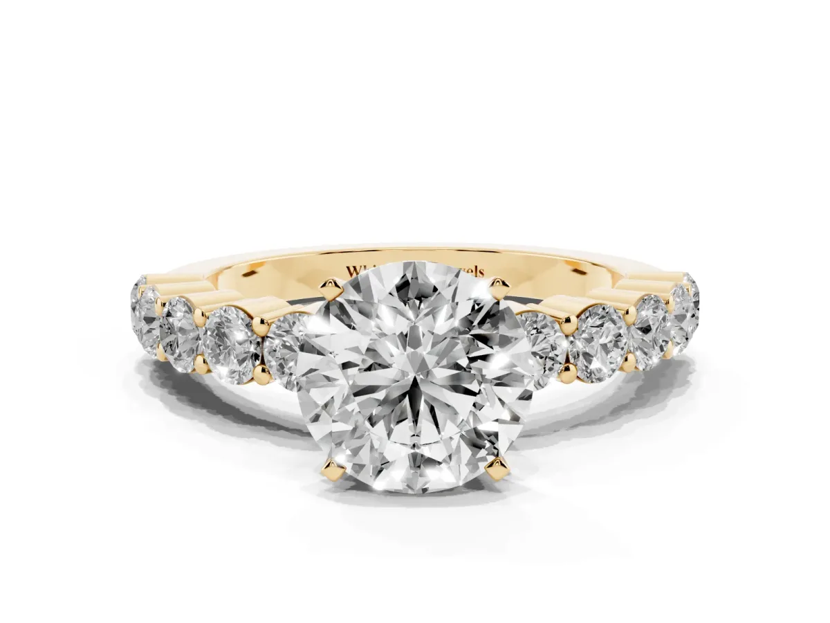 Round Cut Diamond Solitaire Ring with Shared Prong Round Side Stones Yellow gold