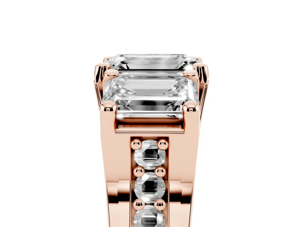 Emerald Cut Diamond Three-Stone Ring with Channel Set Band and Four-Prong Setting Rose gold