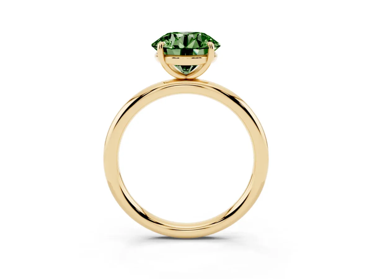 Fancy Green Round Cut Solitaire Diamond Ring with Four-Prong Setting on a Plain Band Yellow gold