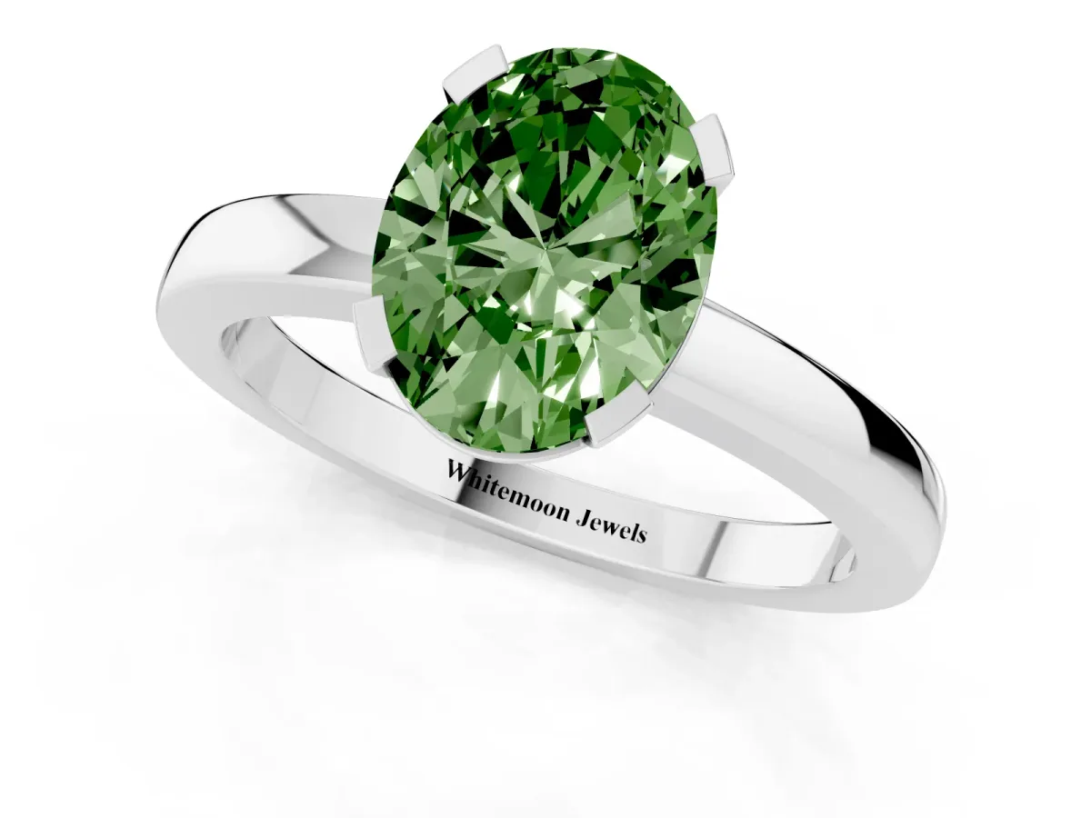 Fancy Green Oval Cut Cut Solitaire Ring with Four-Prong Setting and Classic Band Platinum