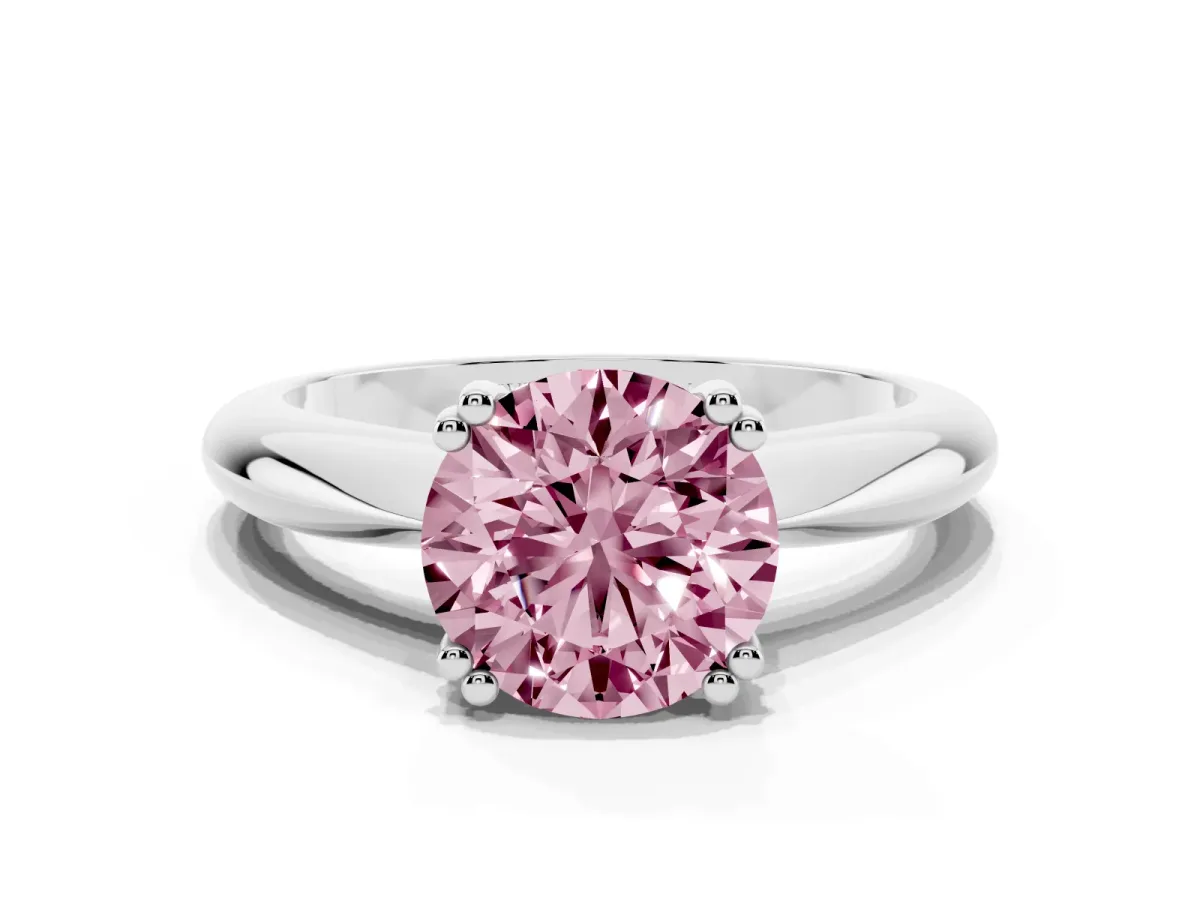 Fancy Pink Round Cut Cut Solitaire Engagement Ring with Tapered Band and Four-Prong Setting Silver