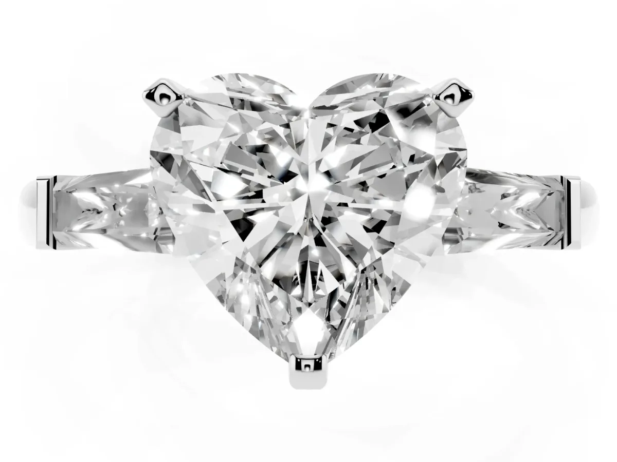 Heart Cut Solitaire with Tapered Baguette Side Stones on a Classic Band with Four-Prong Setting Silver