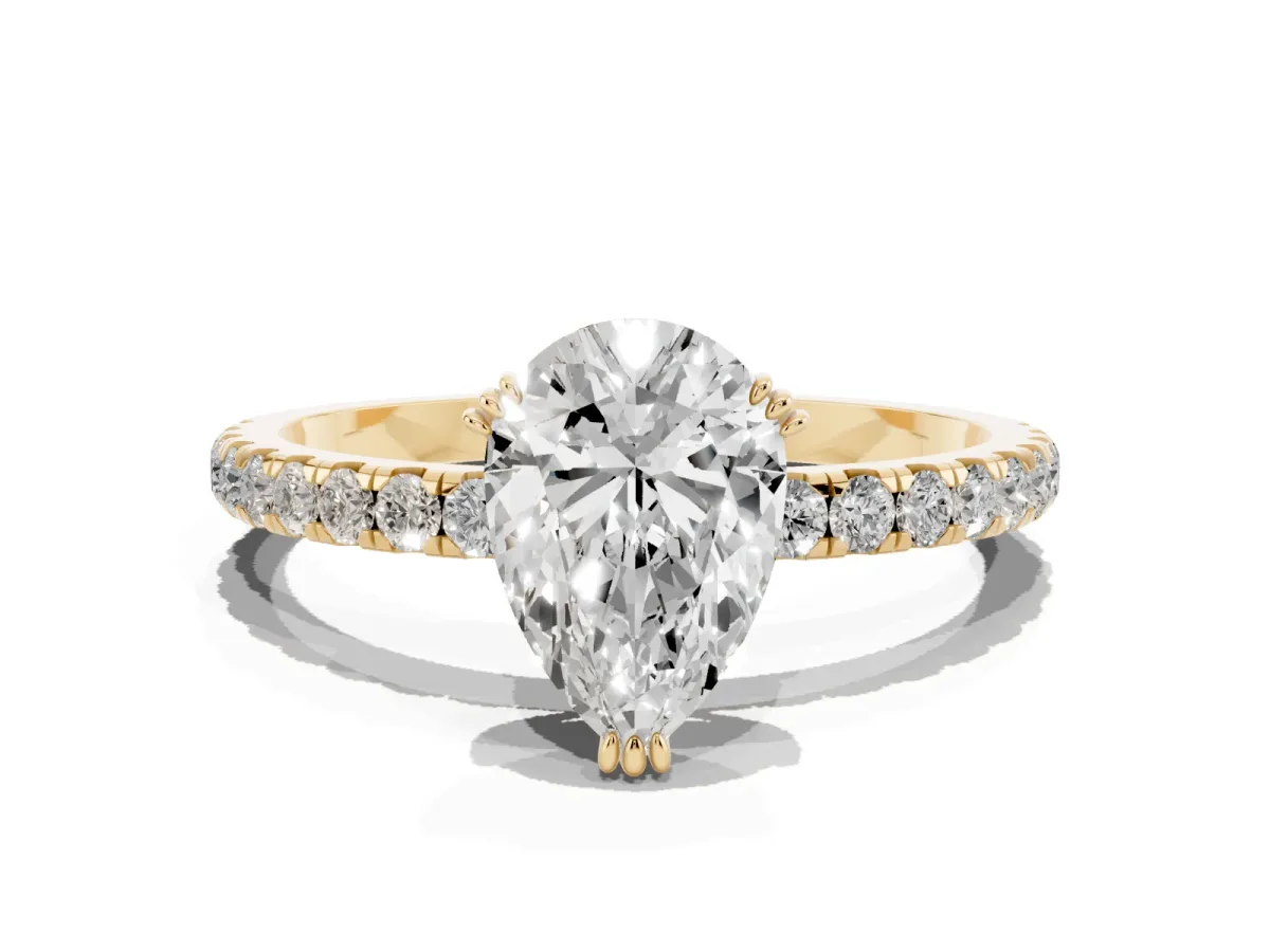Pear Cut Brilliant Solitaire with Pavé Band and Claw Prong Setting Yellow gold