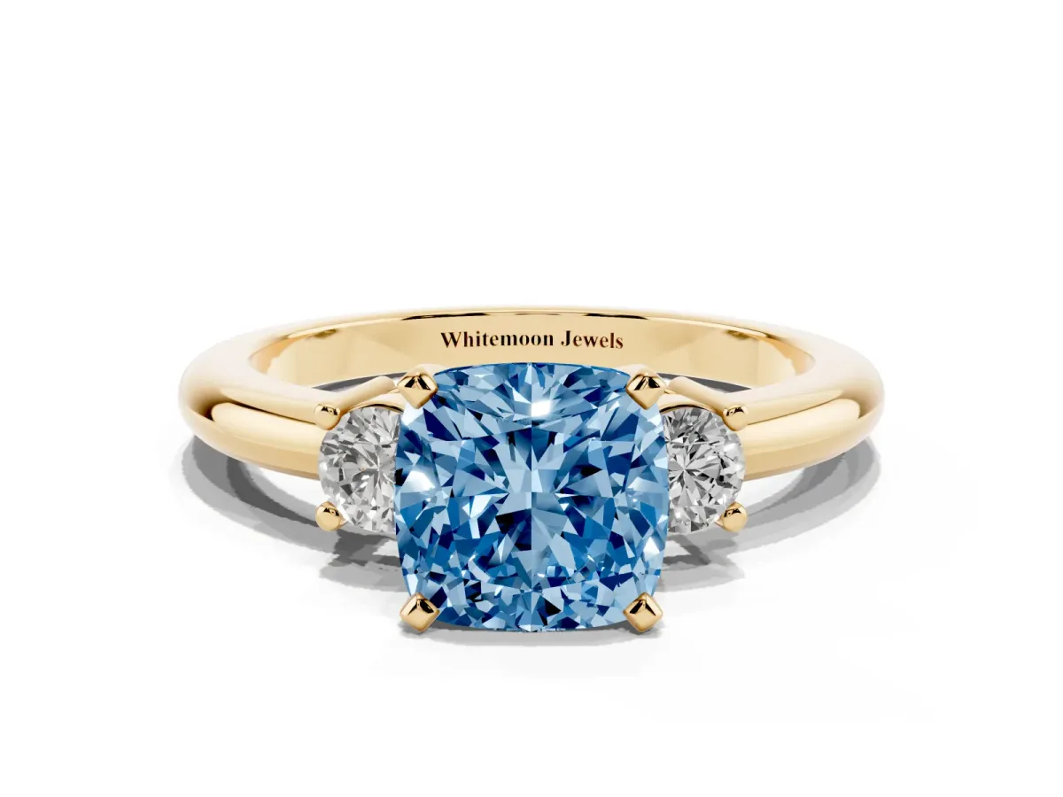 Fancy Blue Three-Stone Cushion Cut Cut Diamond Solitaire with Prong Setting and Classic Band Yellow gold