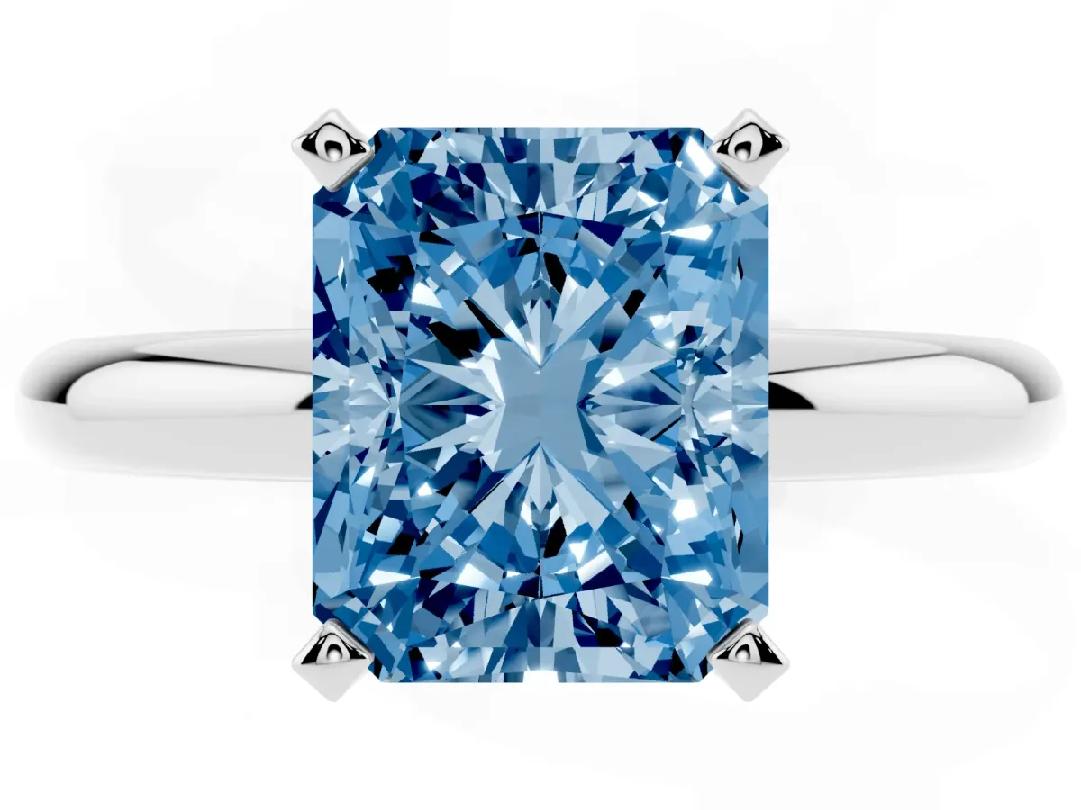Fancy Blue Radiant Cut Diamond Solitaire Engagement Ring with Round Band and Four-Prong Setting Platinum