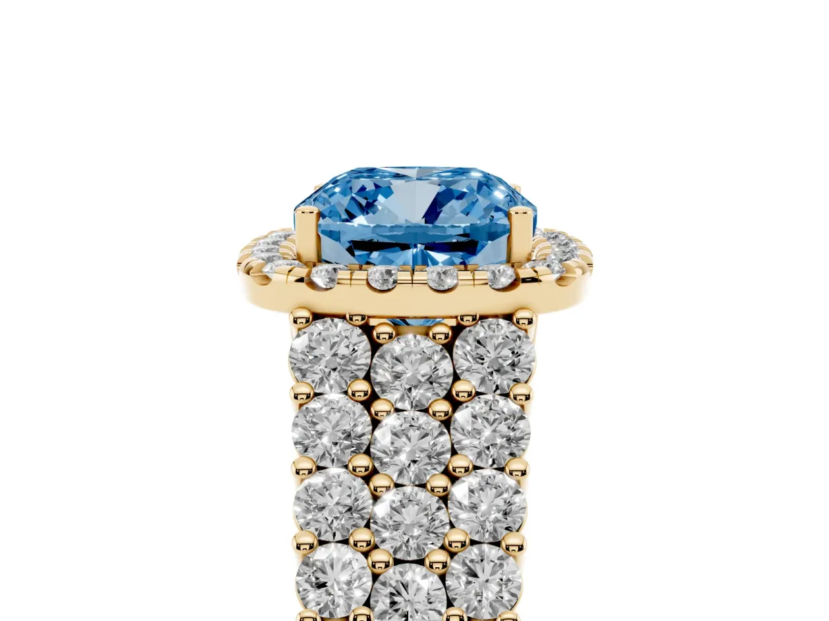 Fancy Blue Cushion Cut Diamond Halo Engagement Ring with Triple Row Round Pavé Band and Prong Setting Yellow gold
