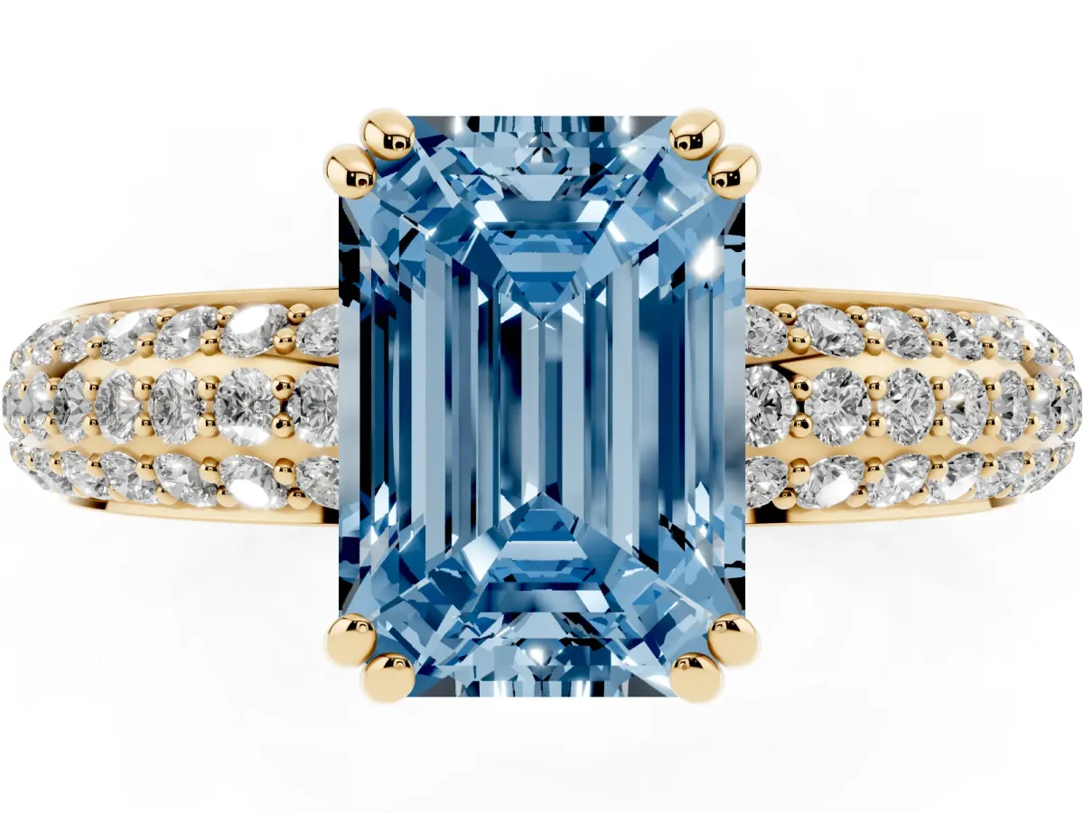 Fancy Blue Emerald Cut Diamond Solitaire Ring with Multi-Row Round Pavé Band and Prong Setting Yellow gold