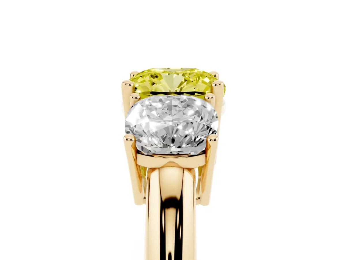 Fancy Yellow Three-Stone Cushion Cut Cut Diamond Engagement Ring with Prong Setting on a White Gold Band Yellow gold