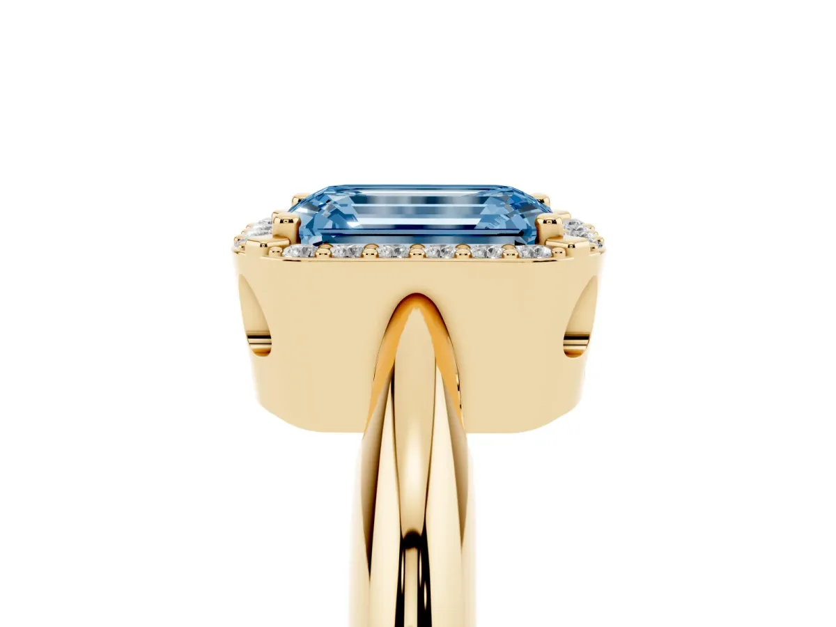 Fancy Blue Emerald Cut Cut Diamond Halo Engagement Ring with Split Shank and Four-Prong Setting Yellow gold