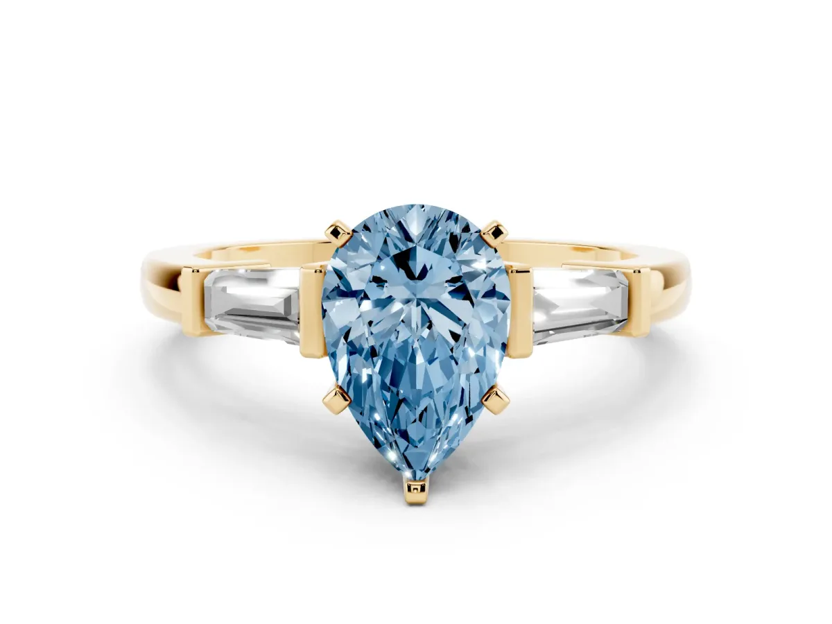 Fancy Blue Pear Cut Cut Diamond Solitaire Ring with Tapered Baguette Accents and Four-Prong Setting Yellow gold