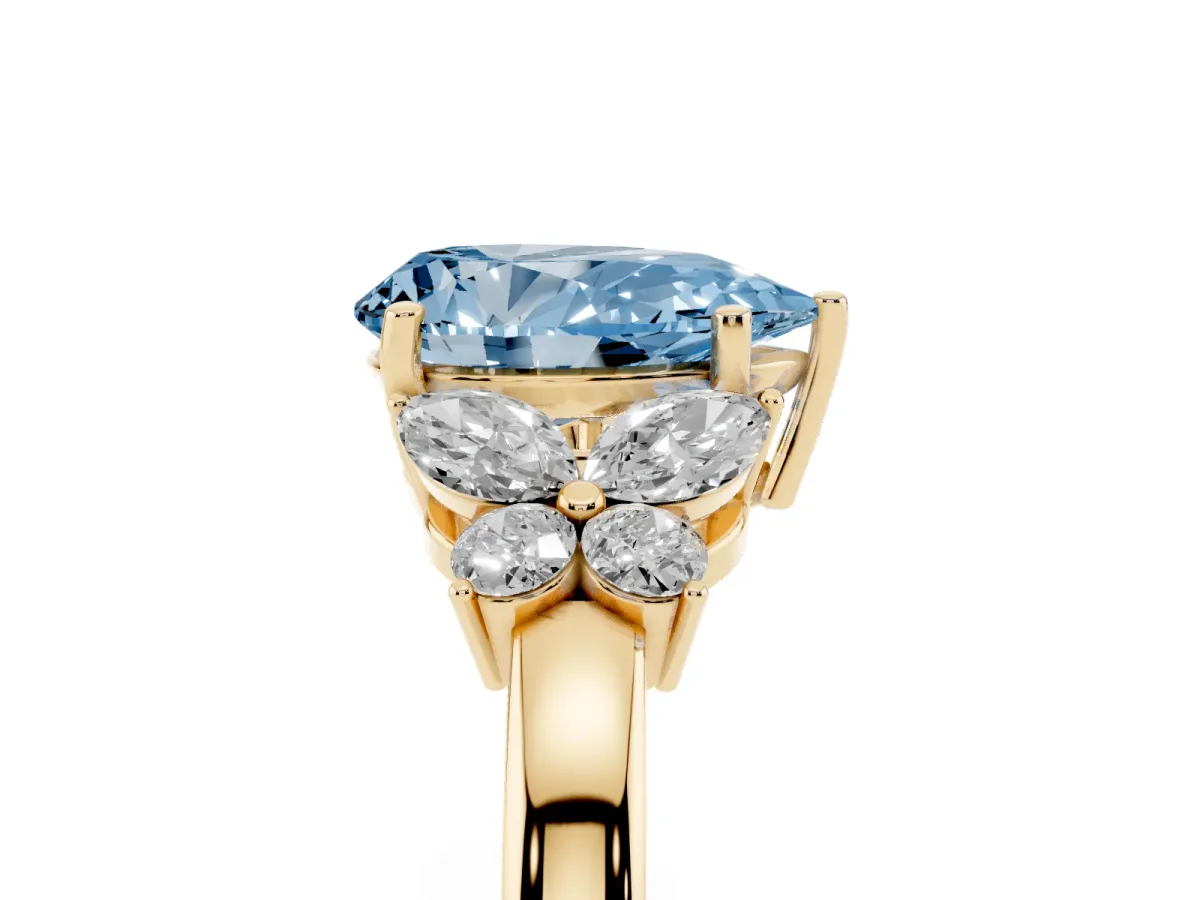 Fancy Blue Pear Cut Cut Solitaire Floral Diamond Ring with Four-Prong Setting Yellow gold
