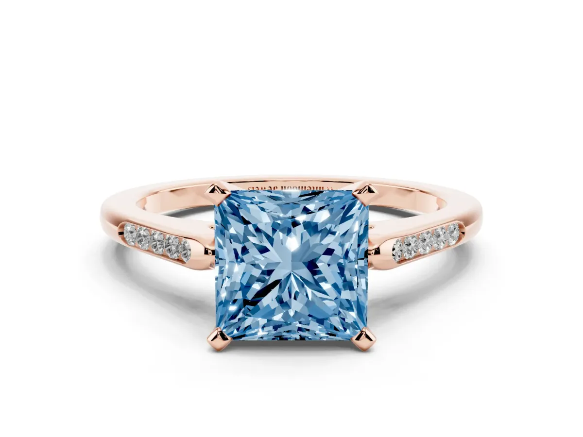 Fancy Blue Princess Cut Diamond Solitaire Ring with Channel Set Round Band and Prong Setting Rose gold