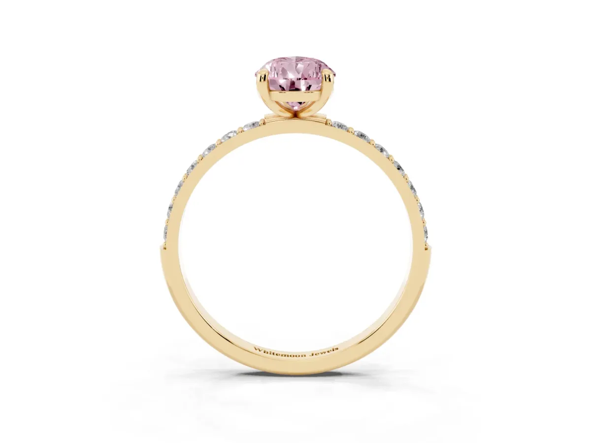 Fancy Pink Pear Cut Diamond Solitaire Ring with Round Pavé Band and Prong Setting Yellow gold
