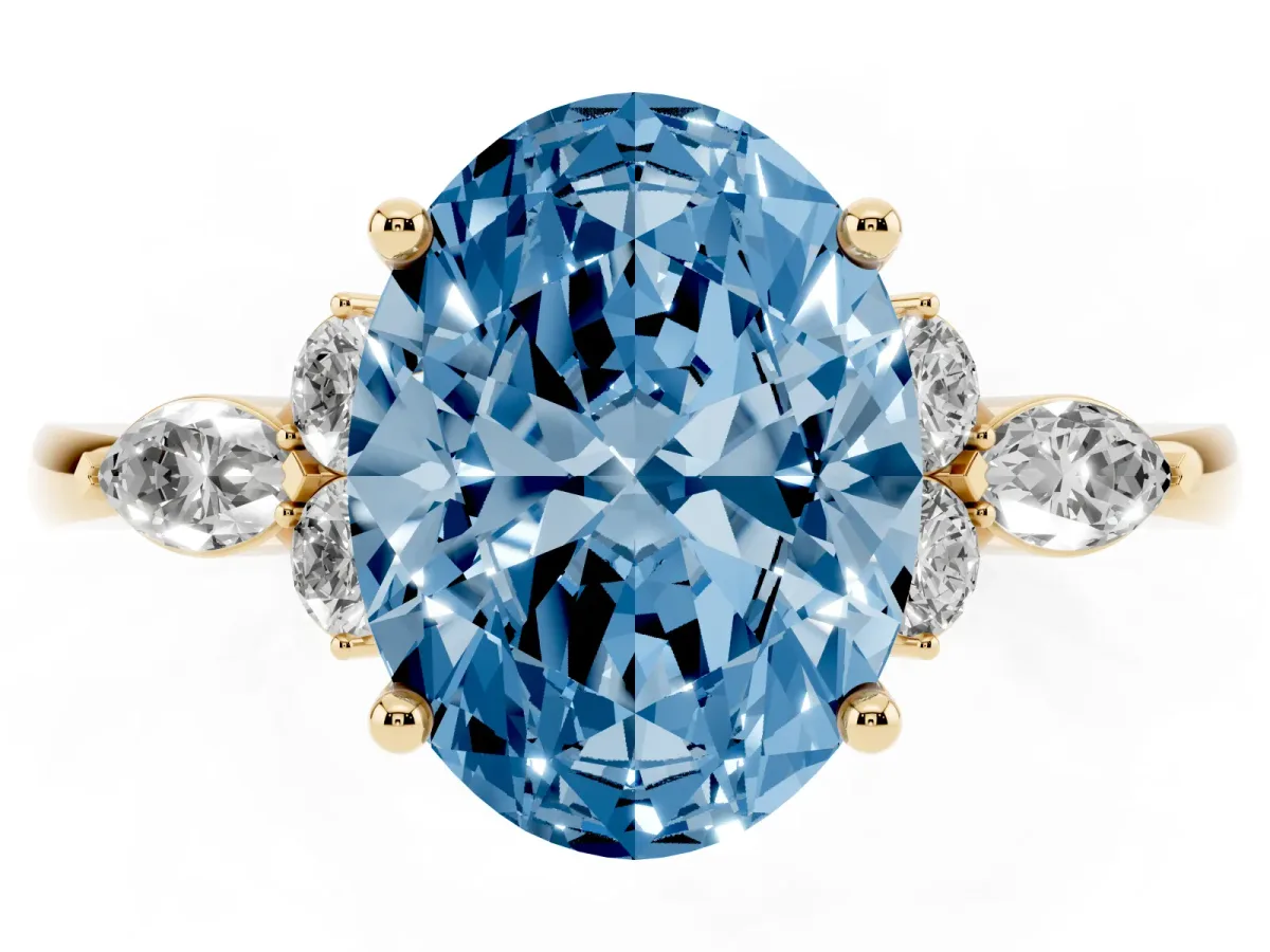 Fancy Blue Oval Cut Brilliant Diamond Solitaire Ring with Pear Side Stones and Four-Prong Setting Yellow gold