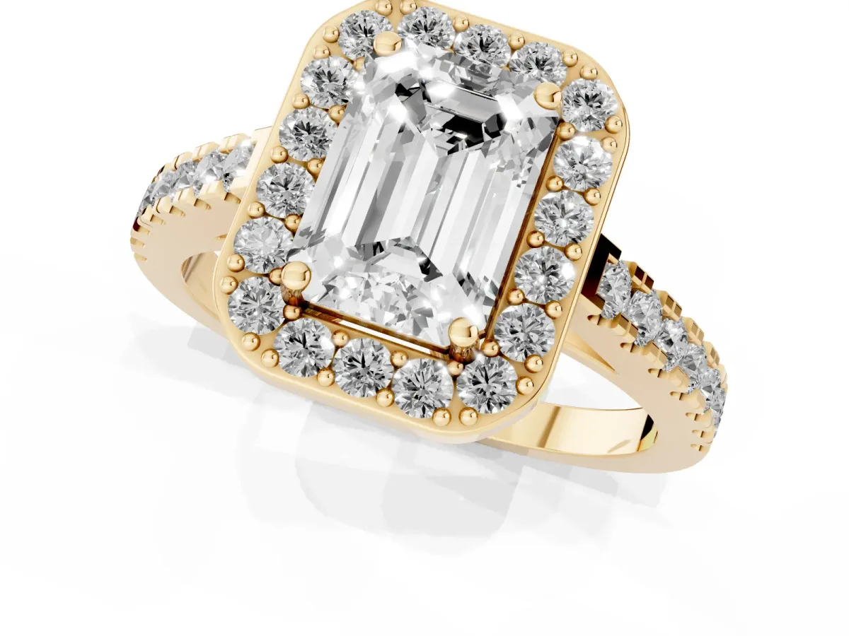 Emerald Cut Diamond Halo Ring with Round Pavé Split Shank and Prong Setting Yellow gold