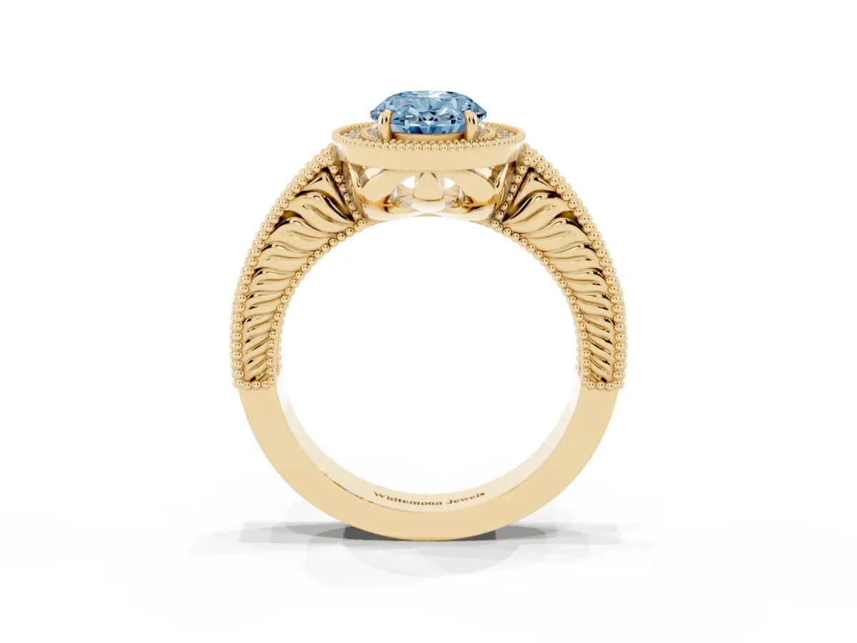 Fancy Blue Oval Cut Cut Halo Diamond Ring with Pavé Band and Four-Prong Setting Yellow gold