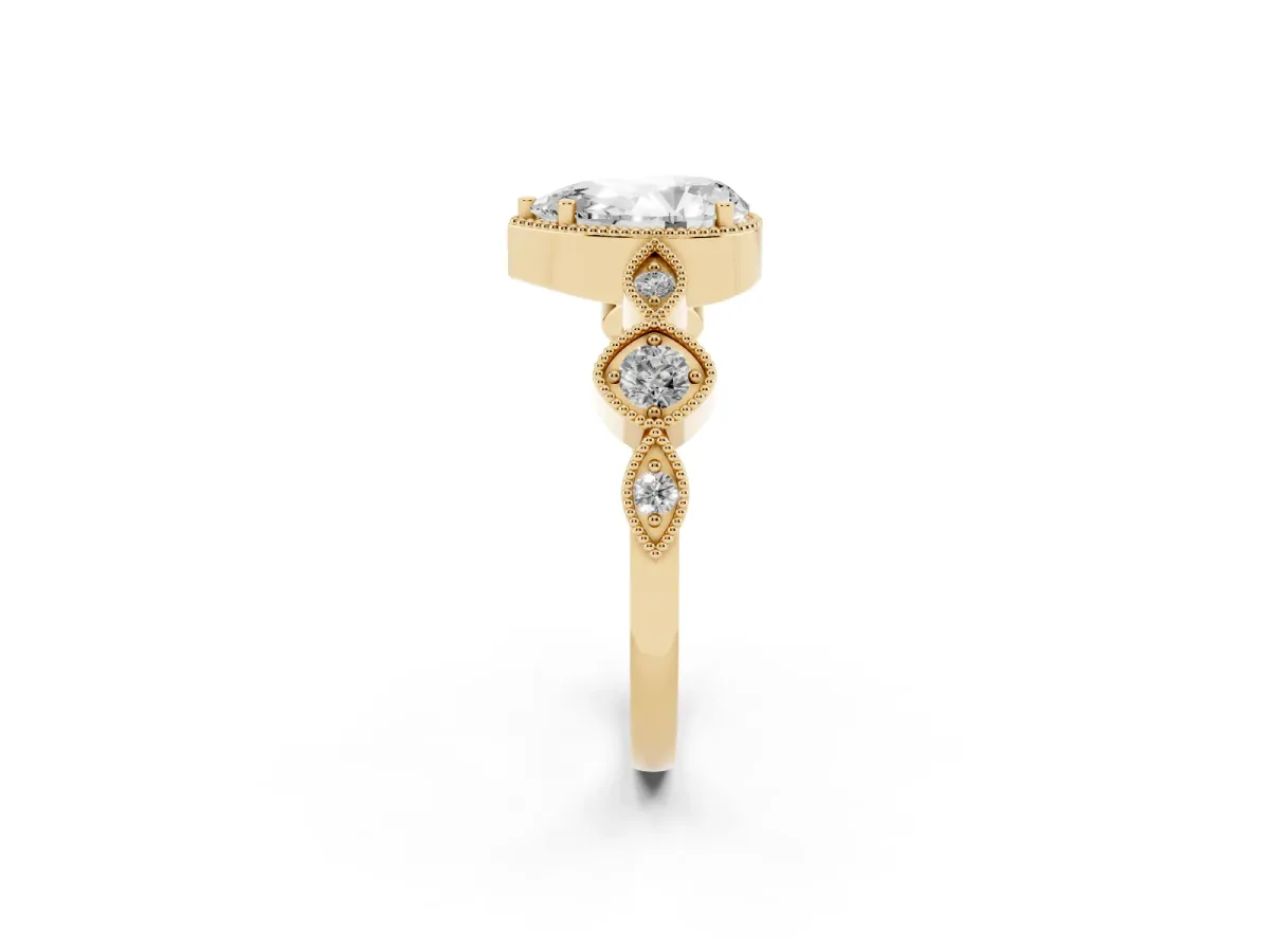Pear Cut Diamond Vintage Milgrain Ring with Round Stations Yellow gold