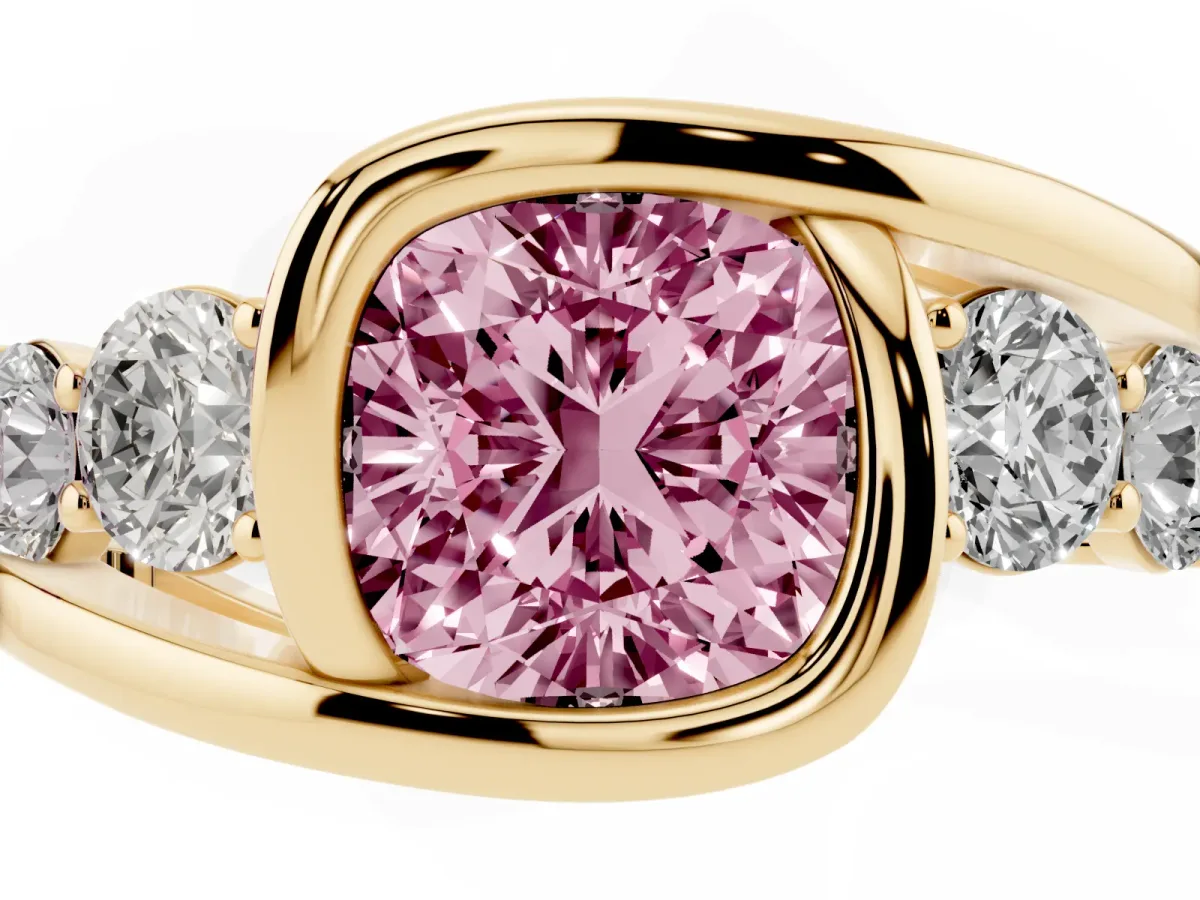 Fancy Pink Bezel Set Cushion Cut Diamond Bypass Ring with Round Accents Yellow gold