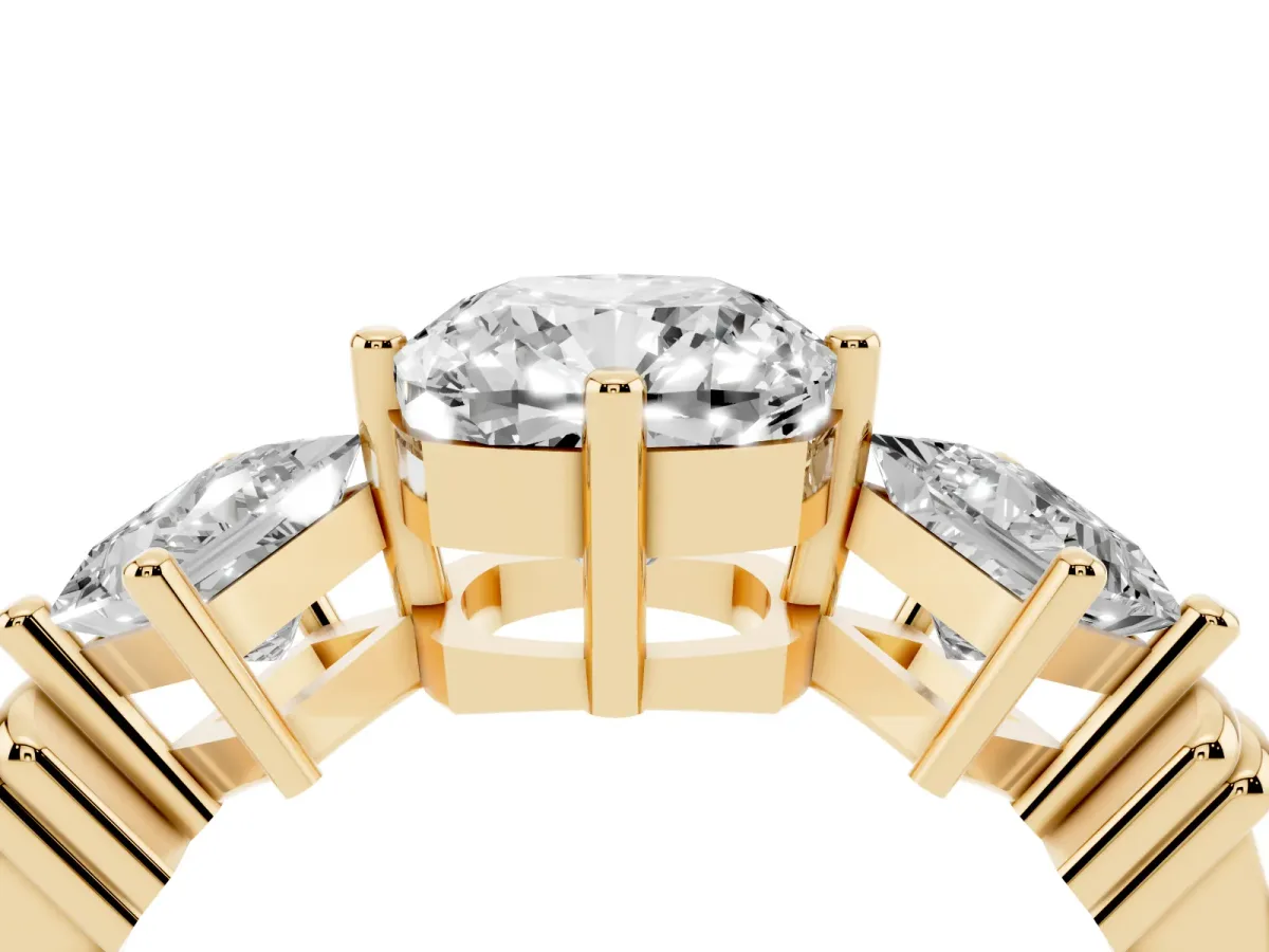 Three-Stone Cushion Cut and Princess Cut Diamond Ring with Channel Band and Four-Prong Setting Yellow gold
