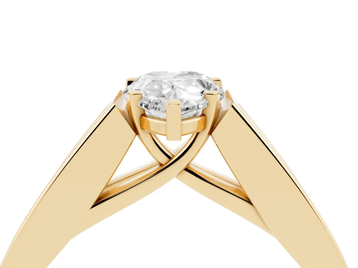 Pear Cut Cut Channel Set Solitaire Ring with Four-Prong Setting Yellow gold