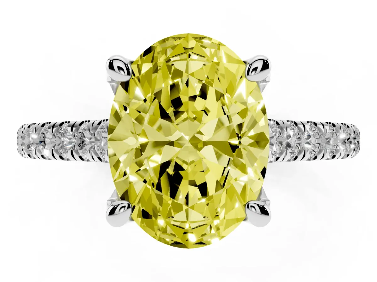 Fancy Yellow Oval Cut Brilliant Diamond Solitaire with Pavé Band and Four-Prong Setting Silver