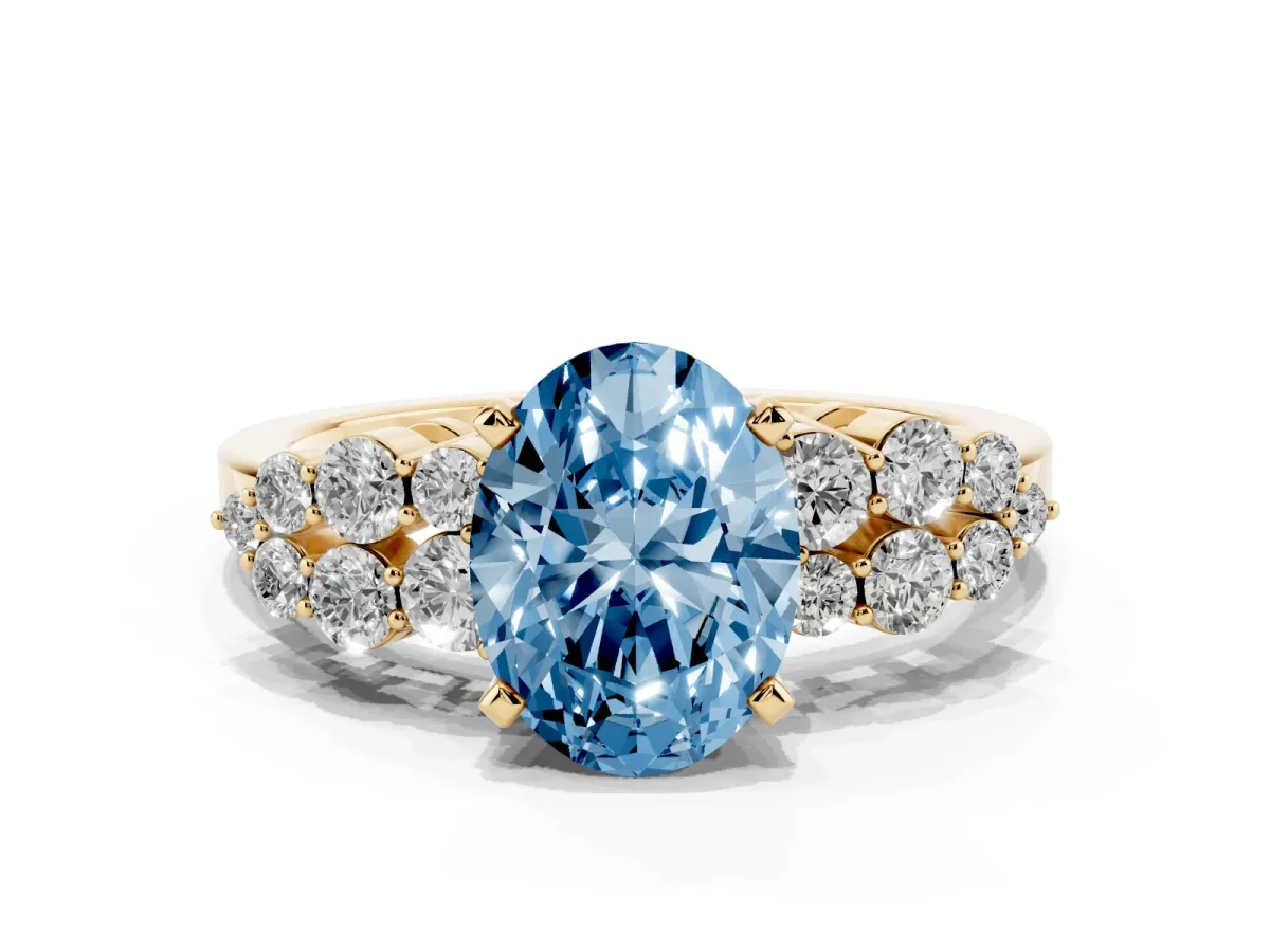 Fancy Blue Oval Cut Cluster Diamond Engagement Ring with Pavé Band and Four-Prong Setting Yellow gold