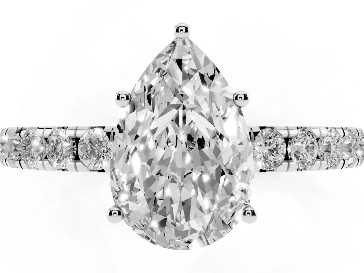 Pear Cut Diamond Pavé Solitaire Engagement Ring with Four-Prong Setting Platinum