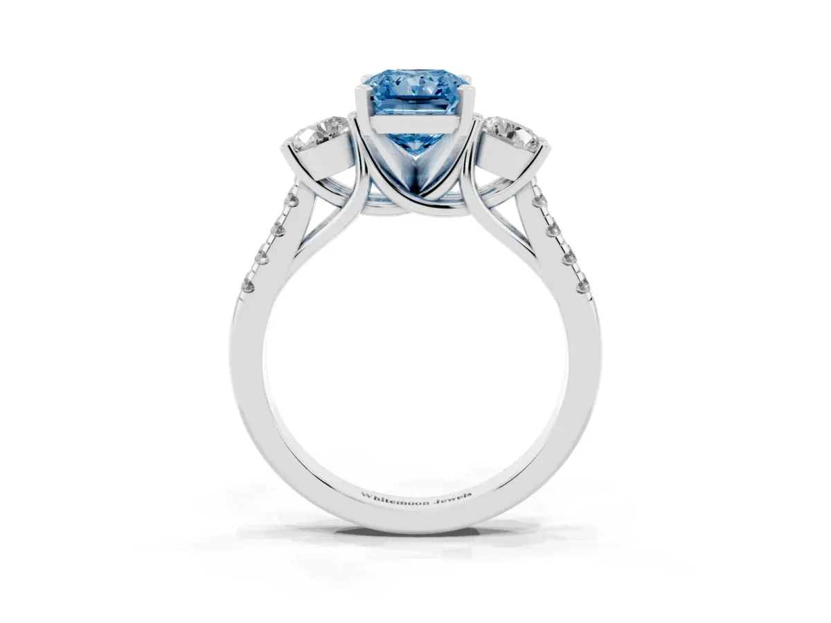 Fancy Blue Three-Stone Radiant Cut Diamond Pavé Band with Four-Prong Setting Platinum